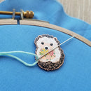 Enamel Needle Minder